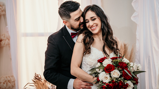 Groom & Bride showing natural for the camera